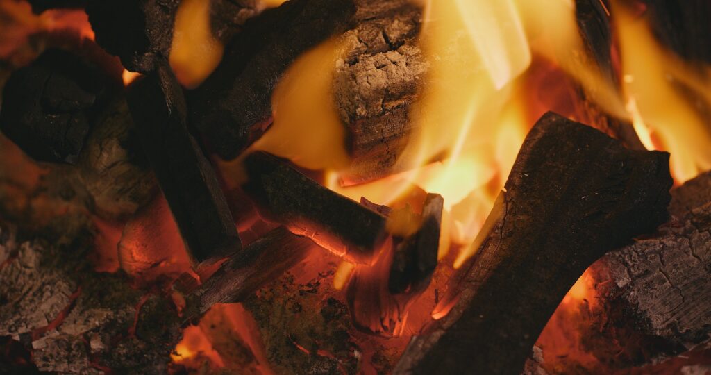 Charcoal burns in the fire