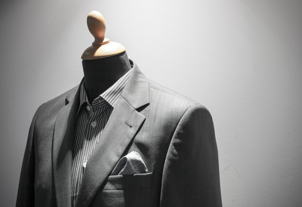 Elegant men suit on mannequin, shopwindow