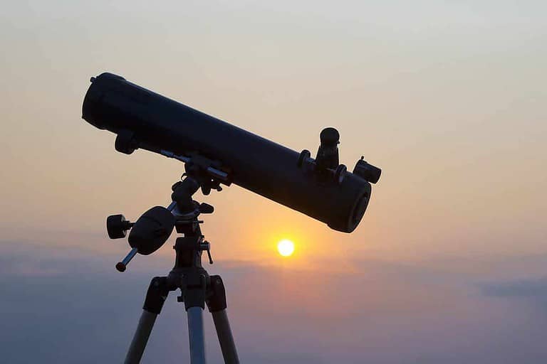 the telescope silhouette at orange sunset