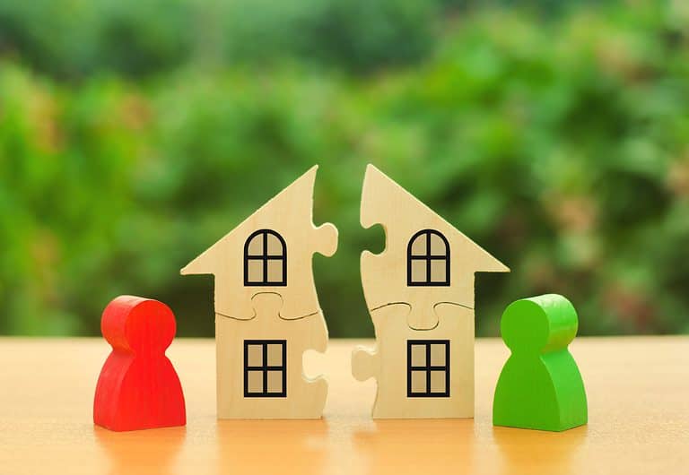 Two human figures divide the house among themselves