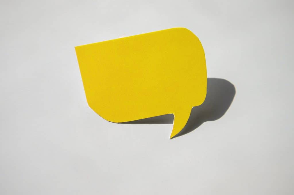 Empty yellow paper dialogue with a speech bubble on a balloon for your design, business concept