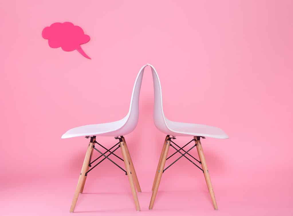 The icon for the text on the back of a pink background